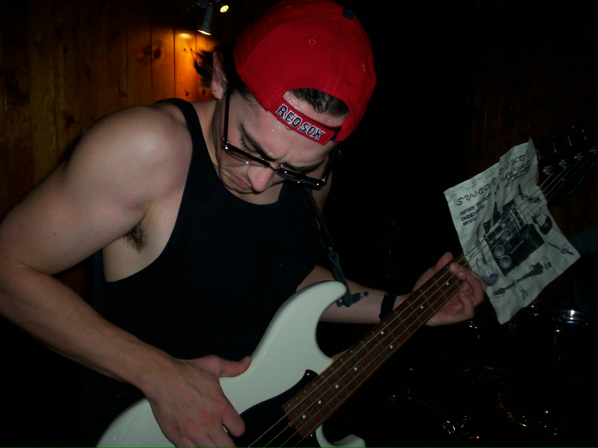 bassist playing in a rehearsal room